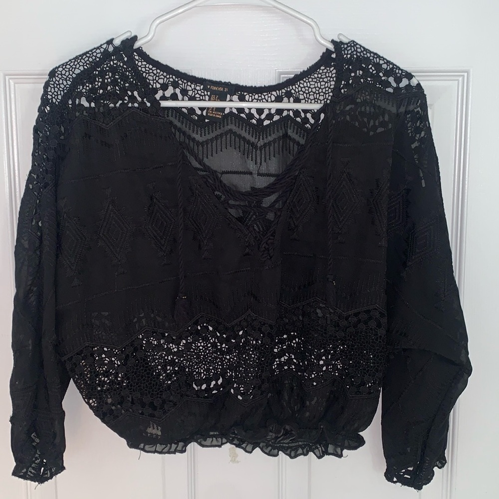Sheer black blouse